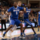 Nick King, No. 5, and Trahson Burrell, No. 0, of the Memphis Tigers battle for position against Domantas Sabonis, No. 11, of the Gonzaga Bulldogs at McCarthey Athletic Center on Jan. 31, 2015, in Spokane, Wash. (William Mancebo/Getty Images)